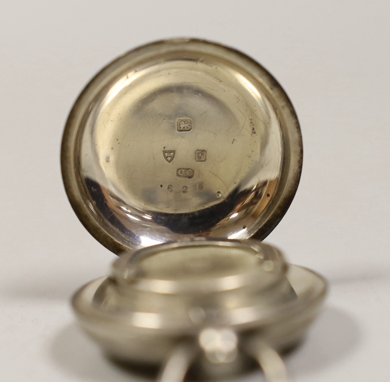 An Edwardian plain silver sovereign case, Colen Hewer Cheshire, Chester 1907, 33mm.